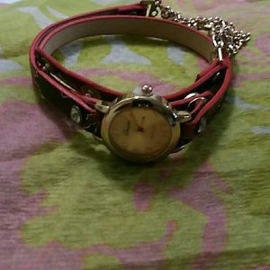 Wrapped around watch with heart pendants
